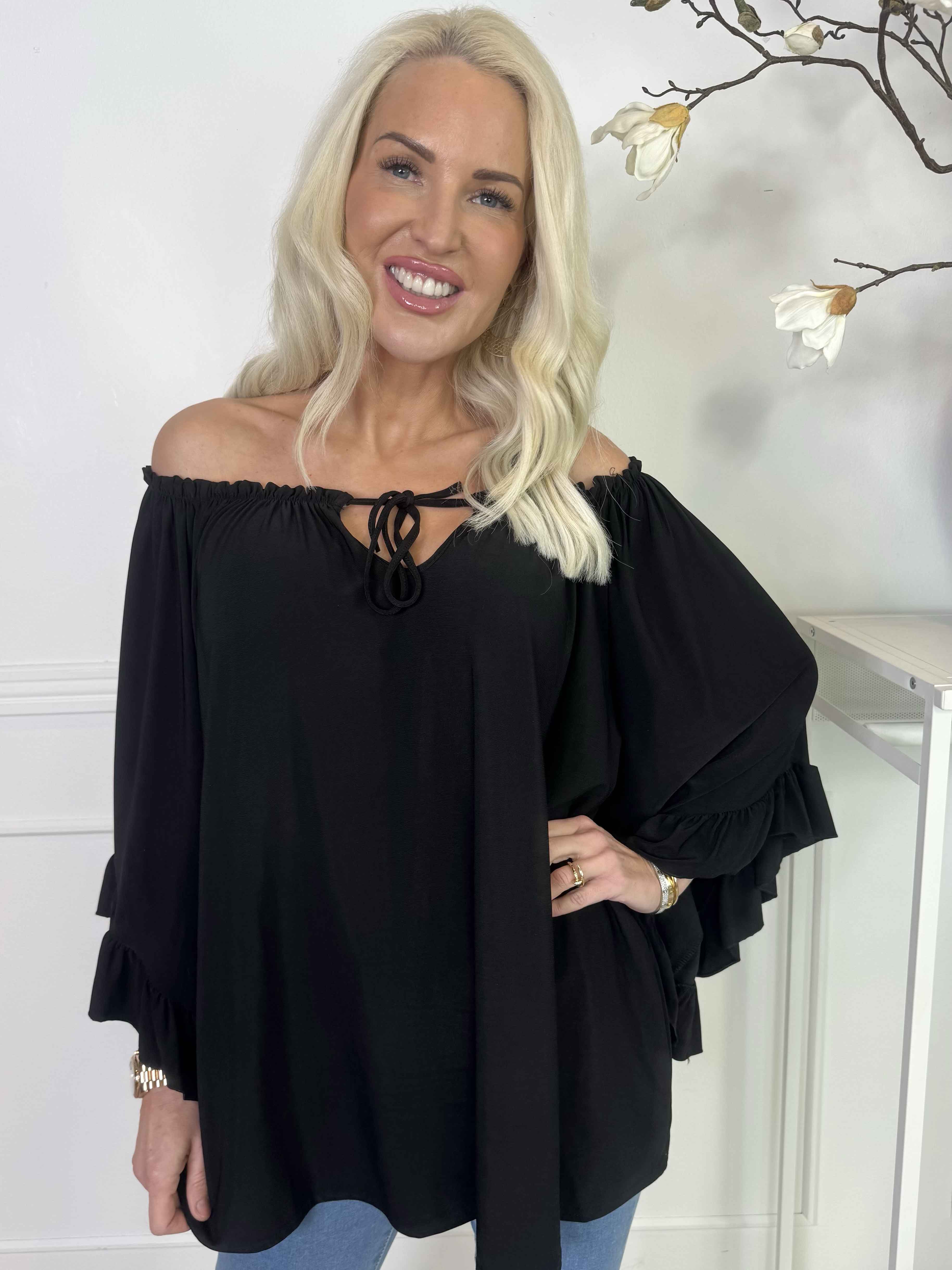 Anneli - Söt elastisk tunika med volangärmar